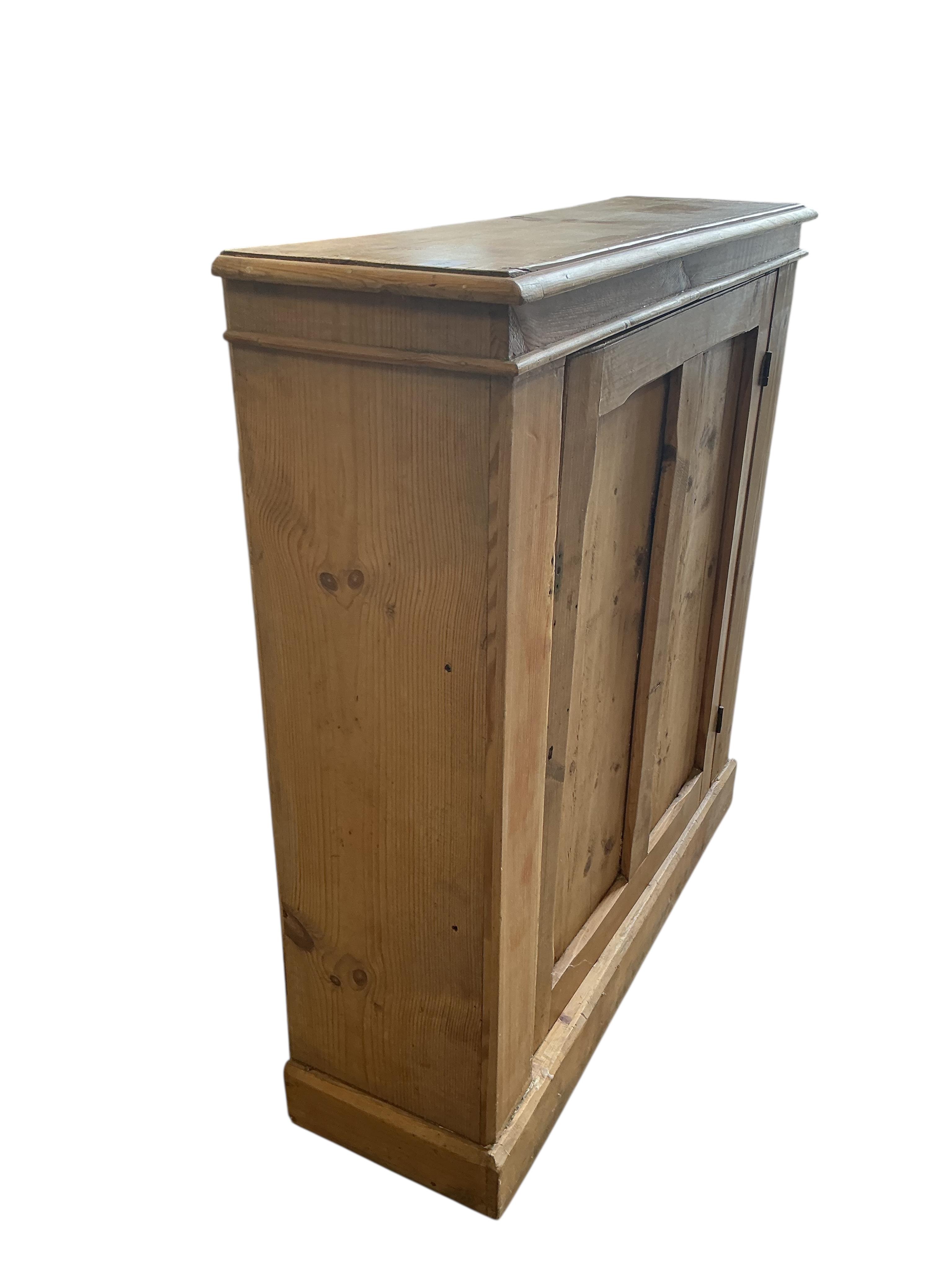 A Victorian pine single door side cabinet, width 100cm, depth 31cm, height 107cm